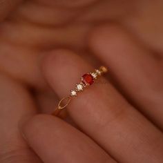 Dainty Ruby Gold Ring, July Birthstone Rings, Ruby Diamond Ring, Red Ruby Stacking Ring, Genuine Ruby Rings, Graduation Ring, Casual Rings We use the highest quality moissanite! Moissanite: ✦ Color: D Colorless ✦ Clarity: VVS1 OR All our diamonds are 100% natural. We use only conflict-free diamonds and gemstones. Diamond: ✦ Color: F-G ✦ Clarity: SI1-VS ✦PRODUCT DETAILS✦ → center stone: natural ruby → accent stone: diamonds Also available in other colored gemstones upon request. Please get in tou Red Open Diamond Promise Ring, Red 14k Gold Birthstone Ring For Promise, Red Ruby Open Diamond Ring, Red Ruby Cluster Ring With Round Cut, Elegant Red Promise Ring, Elegant Red Crystal Round Ring, Elegant Red Round Crystal Ring, Red Birthstone Promise Ring Fine Jewelry, Red Ruby Birthstone Ring In Fine Jewelry Style