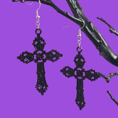 A pair of statement dangle earrings with large black cross charms on 925 sterling silver ear wires.  ✨ DETAILS: - Black metal cross charm 5.7cm x 3.7cm - 925 sterling silver ear wires 🕸️ MATCHING ITEMS 🕸️ GOTHIC CROSS CHOKER: https://www.etsy.com/uk/listing/1115524210/gothic-cross-velvet-choker-various?click_key=dc02222e5f89f5845d6c1f5408a2b634dc2dc9c5%3A1115524210&click_sum=25c7c0d8&ref=shop_home_feat_2 🎃 Shop our Halloween collection here: https://www.etsy.com/uk/shop/BadGhoulsClubUK?sectio Black Cross Pendant Jewelry For Halloween, Black Cross Jewelry For Halloween, Gothic Cross Jewelry With Pierced Details, Gothic Cross Earrings For Pierced Ears, Gothic Cross-shaped Pierced Earrings, Gothic Cross Pierced Jewelry, Black Cross Earrings As Gift, Pierced Gothic Cross Jewelry, Black Cross-shaped Earrings For Gift