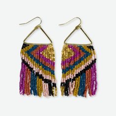 Add a pop of color to your look with the Paige Ascending Diamond Beaded Fringe Earrings in Jewel Tone. These statement earrings feature a striking combination of vibrant hues and a playful, cascading design that is sure to turn heads. --DETAILS-- 3.25" L, 1.10" W Handmade by skilled artisans in India Hypoallergenic nickel + lead-free brass hardware These accessories are made by human hands. A slight variation in size and color is considered part of the beauty of these one-of-a-kind pieces. To ex Festival Multicolor Beaded Fringe Chandelier Earrings, Vibrant Summer Dangle Beaded Earrings, Adjustable Tassel Earrings With Colorful Beads For Party, Colorful Dangling Beads Earrings For Party, Multicolor Beaded Tassel Earrings For Party, Multicolor Beaded Tassel Earrings For Summer, Colorful Beaded Dangling Earrings For Party, Trendy Colorful Dangle Beaded Earrings, Trendy Colorful Beaded Dangle Earrings