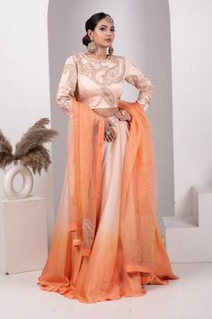 Peach ombre attached cancan lehenga with crystal, breads and zardozi embroidery in paisley motifs. Paired with an embroidered padded blouse and darker peach color dupatta. - Aza Fashions Traditional Peach Lehenga With Sheer Dupatta, Orange Organza Sharara For Wedding, Orange Art Silk Sets For Wedding, Orange Art Silk Wedding Sets, Traditional Peach Wedding Wear With Sheer Dupatta, Orange Art Silk Lehenga For Wedding, Traditional Drape Peach Lehenga For Eid, Peach Choli With Sheer Dupatta For Reception, Peach Choli With Sheer Dupatta For Weddings