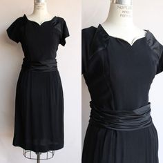 Incredible 1950s Dress In Black Rayon. Has A Cummerbund Belt In Satin. Sweetheart Neckline With Pretty White Contrast, Short Sleeves, A Metal Zipper At The Side. Label Reads: None. Excellent To Great Vintage Condition. The Only Real Thing To Note Is Some Rusting And Wear At The Hooks And Eyes On The Belt. Measurements When Lying Flat. Doubled At Bust, Waist And Hip Armpit To Armpit Across Bust: Approx 40" Waist: 26" Hips: 40" Shoulder To Waist: 16" Shoulder To Bottom Hem: 41" Please Note: These Are Vintage, Preworn And/Or Preloved Items. I Do My Utmost Best To List Any Issues, But Signs Of Wear Should Be Expected, And There Are Occasionally Small Things I Won't Deem Worthy Of Note. Please 1950s Black Dress, Dresses 40s, Vintage 1950s Dress, Vintage 1950s Dresses, Lace Overlay Dress, 1940s Dresses, Rayon Dress, 1950s Dress, Evening Party Dress