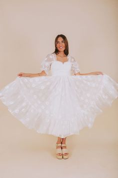 Indulge in a playful afternoon with our EXCLUSIVE Afternoon With You Dress. This white dress features delicate floral accents, puff sleeves, and a corset bodice for a flirty touch. Elastic along the shoulders and cuffs, corset tie back, and invisible zipper closure ensure a comfortable and perfect fit. Complete with ruffle details and a tier hem for a whimsical look. Say yes to this must-have dress! Details *Measurements are taken with item hanging and fabric unstretched.* White dress with white White Puff Sleeve Corset Dress For Summer, Spring White Corset Dress With Fitted Bodice, White Corset Dress With Fitted Bodice For Spring, White Corset Dress With Smocked Bodice And Sweetheart Neckline, White Square Neck Corset Dress For Spring, White Corset Dress With Sweetheart Neckline For Spring, Spring Wedding Corset Dress With Square Neck, White Corset Dress With Puff Sleeves And Ruffles, White Corset Dress With Sweetheart Neckline For Brunch