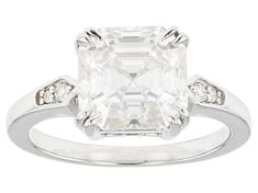 Moissanite Fire® 3.98ctw diamond equivalent weight square octagonal asscher cut and round brilliant cut, Platineve® ring. Measures approximately 5/16" L x 1/16" W and is not sizeable. Actual moissanite weight is 3.47ctw. . White Asscher Cut Diamond Ring For Formal Occasions, White Asscher Cut Diamond Ring For Formal Events, White Asscher Cut Diamond Ring For Formal, White Octagon Brilliant Cut Diamond Ring, Gia Certified Asscher Cut Diamond White Diamond Ring, White Diamond Ring With Asscher Cut, Platinum Diamond Ring With Asscher Cut, Asscher Cut Platinum Diamond Ring, White Octagon Diamond Ring With Vvs Clarity