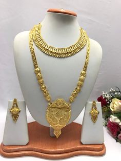 Handmade Indian Jewelry Asian Wedding Bridal Jewellery Party Ethnic Wear 22ct Gold Plated Bridal Necklace Set Rani Haar Bridal Jewellery Set  PLEASE NOTE, This Item Is Not Real Gold .Only Good Quality Gold Plated Jewellery .it is Artificial jewellery. It is a perfect match with formal attire on special occasions or with casual wearing.  Slight Colour variations possible due to difference in screen and photograph Care instructions Keep Jewellery away from direct heat, water, perfumes, deodorants Ceremonial Gold Jewelry With Zari Work, 22k Gold Jewelry With Zari Work, Gold Plated Bridal Necklace For Puja And Festivals, Gold Plated Bridal Necklace For Puja, Traditional Gold Plated Bridal Necklace For Puja, Gold Jewelry With Zari Work For Festivals, Gold Bridal Necklace For Puja With Intricate Design, Gold Kundan Necklace With Zari Work For Puja, Gold Bridal Necklace With Intricate Design For Puja