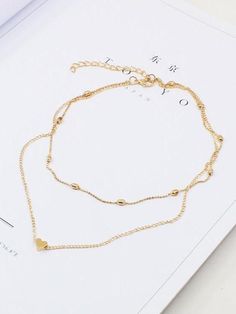 Sku CY-!19645 Material Alloy Occasion Going out , Casual , Vacation , Bohemia , Beach Seasons Spring , Summer , Autumn , Winter Type Necklaces Accessories Color SILVER,GOLD Size FREE SIZE Size chart: Please consult the size chart we provide for this item's measurements to help you decide which size to buy. Valentine's Day Gold Alloy Necklaces, Valentine's Day Gold Alloy Necklace, Trendy Heart Shaped Double Chain Jewelry, Trendy Heart-shaped Double Chain Jewelry, Trendy Gold Charm Necklaces For Valentine's Day, Gold Heart Charm Necklace In Alloy, Gold Alloy Heart Pendant Necklace, Gold Heart Pendant Necklace In Alloy, Gold Heart Necklace In Alloy