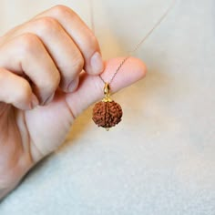 ITEM TYPE: RUDRAKSHA PENDANT BEADS NAME: RUDRAKSHA RUDRAKSHA FACE: 6 RUDRAKSHA COLOR: BROWN PENDANT METAL: PANCHDHATU BEADS ORIGIN: NEPAL BEADS NATURAL: YES BEADS CERTIFIED: YES This is only pendant, chain is not available with it. Shipping: ✤ Free India shipping. ✤ Shipped using FedEx/India Post/DHL were available, insured, and trackable express shipping. SSGjewelryco, you will find a wide array of natural colored gemstones - both precious stones (like Sapphires, Emeralds, Rubies, Natural Pearl, etc.) and semi-precious stones (like Amethyst, Topaz, Malachite, Lapis Lazuli, etc.). We have 40 different types of gemstone categories online and this number is set to increase every month Thanks For Visiting Store SSGjewelry Rudraksha Locket Design, Rudraksha Necklace Women, Single Rudraksha Chain, Rudraksha Necklace For Men, Gold Chain With Rudraksha, Gold Chain With Rudraksha For Men, Rudraksha Locket For Men, Rudraksha Pendant For Women, Rudraksh Pendant For Men