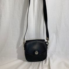 "Measurements are 7\" wide, 7\" high, 2\"3 deep with a 43\" shoulder strap. On the interior there is one main compartment with a back zipper pocket, lined in black vinyl with a front magnetic closure. This is a lovely Renoma shoulder bag with silver tone hardware and is a great vintage find. 100% genuine Renoma made in France. -----------------------------------------I SHIP WORLDWIDE------------------------------------------------- I want to stress that item is vintage which means it's not new. Croc Leather, Black Pebbles, Leather Bucket, Yellow Leather, Black Vinyl, Leather Tote Bag, Magnetic Closure, Pebbled Leather, Leather Purses