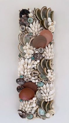 a sculpture made out of shells and seashells