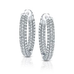 This delicate hoop earrings showcase 200 round-cut brilliant white natural diamonds in classic Pave setting. It is available in your choice of 14k white gold and secures with a Clip In clasp. These hoop earrings are a staple for every jewelry collection, and make the perfect gift for any occasion. Black Diamond Pendant, Black Diamond Studs, Halo Diamond Earrings, Solitaire Diamond Pendant, Colored Diamond Rings, White Lab, Halo Earrings, Black Diamond Ring, Diamond Drop Earrings