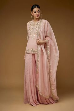 Rose pink short kurta with floral, cutdana, zari hand embroidery. Paired with mukaish embroidered sharara and scallop trimmed dupatta with floral embroidery. - Aza Fashions Pink Palazzo Set With Dori Work, Pink Dori Work Kurta For Reception, Pink Kurta With Dori Work For Reception, Pink Gota Work Salwar Kameez For Reception, Pink Salwar Kameez With Gota Work For Reception, Pink Sharara With Dori Work, Traditional Pink Palazzo Set For Reception, Pink Palazzo Set With Dori Work For Wedding, Pink Palazzo Set With Resham Embroidery For Reception