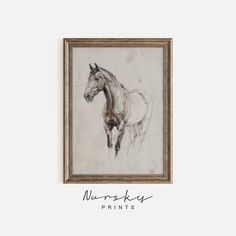 a drawing of a horse in a wooden frame on a white wall with the words, nurrsthy paints written below it