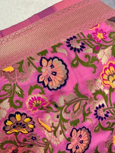 Paithani Style Floral Semi Banarasi Silk Dupatta. Meenakari Work with gold Zari Work. Handloom Dupatta, very light weight and soft. Item: DupattaBase color : Baby Pink Fabric : Banarasi Semi Soft Silk (Not Pure Silk)Work : Weaved with tasselsLength of the Dupatta : 88 inches approx.Width of the dupatta : 35inches (Approx.)Please note there are threads on the back side of the dupatta. Store Policies- No return or exchange will be accepted for color variations.- No return or exchange will be accep Pink Meenakari Lehenga For Puja, Pink Meenakari Traditional Wear For Eid, Pink Meenakari Saree For Diwali, Pink Traditional Wear With Meenakari For Eid, Pink Paithani Silk Traditional Wear With Patterns, Pink Paithani Silk Traditional Wear With Traditional Patterns, Pink Traditional Wear With Paithani Silk And Traditional Patterns, Pink Katan Silk Traditional Wear With Meenakari, Pink Paithani Silk Traditional Wear For Eid