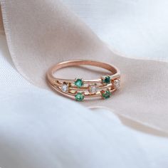 Make your day with our emerald & diamond ring! It's perfect for an engagement ring, wedding or anniversary ring. Natural emerald engagement ring is made of solid gold in a unique and delicate style. Choose your color of gold and ring size from the drop down menu. If you are looking to make this piece even more custom and special, feel free to contact me! We will find a way to make something specially for you.✨ DIAMOND DETAILS QUANTITY 3ps MEASUREMENTS 2.5mm CLARITY GRADE SI COLOR GRADE G GEM Green Diamond Stackable Rings For May Birthstone, Diamond Stackable Rings With May Birthstone, Diamond Stackable Rings For May Birthstone, 14k Gold Emerald Ring For Promise, May Birthstone, Green Diamond Stackable Rings With Birthstone, Dainty Emerald-cut Diamond Promise Ring, 14k Gold Emerald Promise Ring, May Birthstone, Promise Rings With Brilliant Cut May Birthstone, Green Emerald Cut Diamond Ring With Rose Cut Diamonds