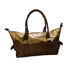 This Vintage Bueno Overnight Bag Is Crafted From Soft Camel-Colored Faux Leather, Making It A Stylish And Durable Option For Any Traveler. The Satchel/Top Handle Style With Gold Exterior Color Gives It A Classic Look That Will Never Go Out Of Style. The Medium Size Is Perfect For Carrying All Your Essentials And The Leather Lining Adds An Extra Touch Of Luxury. Brand New Or Pre-Owned, This Bueno Bag Is A Great Addition To Any Collection. Leather Overnight Bag, Leather Making, Camel Color, Overnight Bag, Travel Luggage, Luxury Brand, Go Out, Out Of Style, Brown Gold