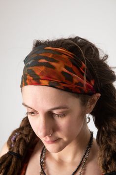 Compliment your colorful wardrobe with these one of a kind stretchy tie dye bandanas. Rock it as a hippie headband, a tie dye scrunchie, a colorful neck warmer, or whatever way you choose. Whether you match your favorite tie dye dress or style it with a simple color palette, the beauty of tie dye is that you can mix and match it as you see fit, and it makes everything look better ✌️ Black Bohemian Headwrap In Headband Style, Black Bohemian Headwrap Headband, Bohemian Bandana Headband For Festival, Bohemian Bandana Styled As Headband For Festivals, Hippie Festival Bandana Headband, Festival Headwrap Headband, Multicolor Bandana With Matching Headband For Festival, Multicolor Hippie Bandana, One Size, Festival Bandana Headband, One Size Fits Most