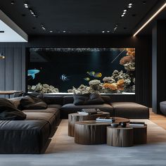 a living room filled with furniture and an aquarium