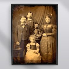 an old time photo of a family posing for a picture