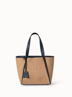 color:camel-marine|gallery Elegant Straw Tote Bag For On-the-go, Luxury Straw Tote Bag With Rolled Handles, Chic Straw Bag With Double Top Carry Handles, Chic Bucket Bag With Leather Trim, Chic Travel Bucket Bag With Rolled Handles, Elegant Straw Bag With Leather Trim For Travel, Elegant Straw Bag With Double Leather Handles, Luxury Straw Bag With Rolled Handles For Daily Use, Chic Summer Shoulder Bag With Leather Trim