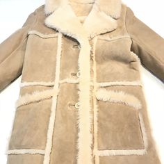 Kashani Ladies Natural Sherpa Lined Shearling Coat - Dudes Boutique Cream Sheepskin Fur Coat For Winter, Cream Sheepskin Fur Coat With Long Sleeves, Cream Long Sleeve Sheepskin Fur Coat, Cream Sheepskin Fur Coat With Faux Fur Trim, Beige Shearling Fur Coat With Faux Fur Trim, Classic Beige Fur Coat With Faux Fur Lining, Cream Sheepskin Outerwear With Faux Fur Lining, Sheepskin Fur Coat In Beige For Cold Weather, Beige Shearling Fur Coat With Faux Fur Lining