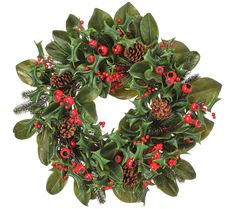 a christmas wreath with holly, berries and pine cones