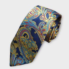 Treat yourself with a new pattern and splash of color to your look with this unique tie set. 100% Silk Handmade Package Includes: Tie, Pocket Square & Cufflinks. Length: 59" Width: 3.34" Warm iron if needed We offer FREE International Shipping World Wide! Unique Ties, Red Paisley, Cufflink Set, Tie Set, Lifestyle Clothing, Tie And Pocket Square, Silk Ties, Pocket Square, Yellow Blue