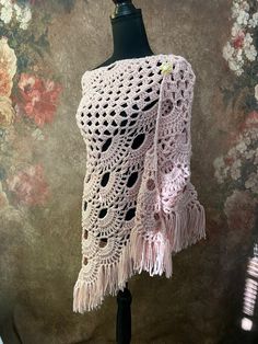 This listing is for one handmade crocheted shawl in pale pink.  Shawl measures approximately  70 inches across and 35 inches long.  Made from 100% acrylic yarn.  Comes with a gold tone heart pearl pin.  Super soft and warm!  Thank you so much for looking! Please check out my shop for more one of a kind handmade gifts. Pink Crochet Lace Shawl In Bohemian Style, Bohemian Pink Shawl With Crochet Lace, Pink Bohemian Shawl With Crochet Lace, Pink Crochet Shawl One Size, Crocheted Shawl, Pink Shawl, Crochet Pink, Shawl Crochet, Crochet Fringe