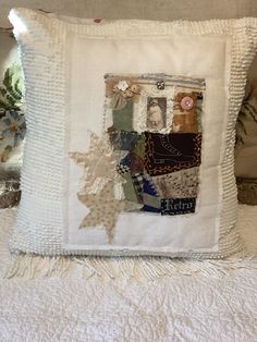 a white pillow with some pictures on it