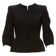 ALEXANDER MCQUEEN black 100% wool cropped sleeve peplum jacket IT38 XS Reference: EALU/A00015 Brand: Alexander McQueen Material: Wool Color: Black Pattern: Solid Closure: Button Lining: Black Fabric Extra Details: Peplum back. Made in: Italy CONDITION: Condition: Excellent, this item was pre-owned and is in excellent condition. This item is in excellent condition and ready to be loved. Comes with: Style code present (Generic) SIZING Designer size: IT38 Size reference: US0 / UK6 / IT38 / FR34 / XXS-XS MEASUREMENTS: Shoulder to shoulder: 35cm / 13.7" Chest: 39cm / 15.2" Waist: 32cm / 12.5" Length: 54cm / 21.1" Sleeve length: 42cm / 16.4" This Alexander McQueen item is authentic. Alexander Mcqueen Blazer, Corporate America, Peplum Jacket, Luxury Clothes, Pretty Clothes, To Be Loved, Black Pattern, Luxury Outfits, Black Fabric