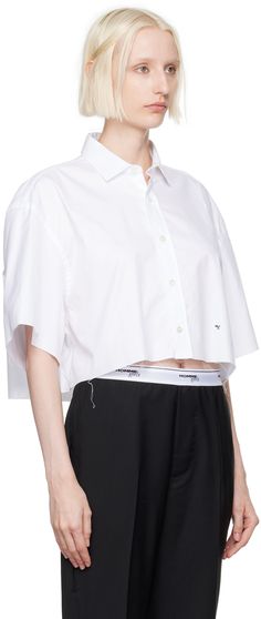 Oversized cotton twill shirt. · Spread collar · Button closure · Logo embroidered at front · Raw edge at cropped hem and cuffs · Box pleat at back yoke Supplier color: White Oversized White Collared T-shirt, White Oversized Top With Logo Detail, White Oversized Cropped T-shirt For Streetwear, White Boxy Cotton T-shirt, White Cotton T-shirt With Contrast Panels, Cut Shirt, Twill Shirt, Box Pleats, Cut Shirts