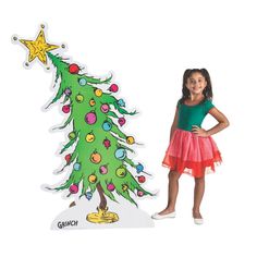 There's no mistaking the iconic wonky Christmas Tree from The Grinch! Add this stand-up decoration to your party supplies for a Grinch Christmas party or use it as classroom décor. Standing at over 5 ft. tall, this Christmas tree decoration makes a very Grinch-y statement! Pair the tree with our Dr. Seuss(TM) The Grinch Cardboard Stand-Up (13910468) to complete your Grinch theme! Cardboard. 44" x 64 1/2" Stand-ups are one-sided with a brown cardboard back. Simple assembly required. © OTC / (TM) Dr Seuss Christmas Tree, Christmas Tree Cardboard, Whoville Christmas Tree, The Grinch Christmas Tree, Whoville Tree, Tree Cardboard, Dr Seuss Decorations, Grinch Door, Cardboard Stand