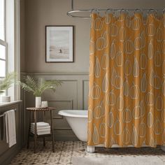 a bath room with a tub and a shower curtain