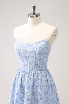 a light blue dress on a mannequin