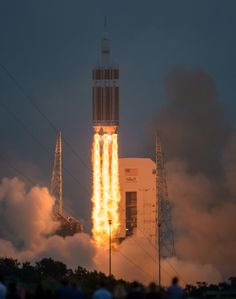 an image of a rocket launching into the sky