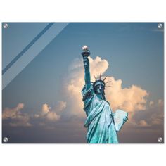 the statue of liberty in new york city, ny with clouds and blue sky behind it