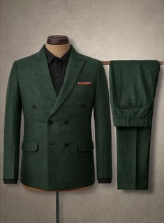 Make an entrance in our Bottle Green Herringbone Tweed Suit that isn't afraid to let its true colors fly. Crafted from wool, the suit features a herringbone pattern that develops a bit of texture and mystique, while its bottle green color places itself in the super suave category, making it ideal for a distinctive appearance.   Look Includes    Bottle Green Herringbone Tweed  Fabric  Double Breasted Jacket Style   Peak Lapel (3-3.2')  Horn Royal Black Buttons    Classic Vest   Single Vent  Three Cuff Buttons  Two Welted Pocket on Trousers   Click 'Customize Now' to modify the look if needed.  Lining: Viscose; Dry Clean. Wool Suits With Herringbone Pattern For Business Casual, Tailored Wool Suits With Herringbone Pattern, Tailored Wool Suit With Herringbone Pattern, Wool Suits With Herringbone Pattern And Suit Collar, Wool Three-piece Suit With Welt Pockets For Winter, Winter Tweed Three-piece Suit, Green Wool Suit With Suit Collar, Semi-formal Winter Suits With Herringbone Pattern, Winter Wool Suit With Herringbone Pattern