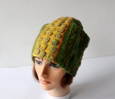 Felted hat Green wool hat, Felt winter warm hat, Wool Hat Unisex, Warm felt hat Green  felted hat autumn hat This felted hat was made of soft merino wool and fancy yarn wool through a wet felting process.  Felt hat is decorated with  silk fibers and silk fabric  You can make folds and wearing a hat on the different ways. Felted hat is warm and perfect for cold weather.   Head circumference 57- 58 cm (22,5-23'') Full height caps  27см (10 in)  You can have set with scarf and mitts  https://www.et Winter Felt Hat, One Size Fits Most, Winter Felt Hat One Size, Winter Felt Hat One Size Fits Most, Winter Felt Beanie Hat, Winter Wool Hat As Gift, Green Wool Felt Hat For Winter, Winter Mini Hats With Short Brim In Green, Adjustable Felt Hat For Winter, Green Winter Mini Hats With Short Brim