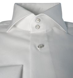 Our signature tuxedo dress shirt is something that has broken the internet. In a world where features like this are only found in custom shirts, we have decided to create a collection that delivers the same value without having to get measured and pay a hefty price. These shirts will give you that bold look! Never worry again about your collar sliding inside your jacket or not being even. No need for collar stays either! You will be addicted to your new shirts! Quality Details: White True to siz Designer Fitted Shirt For Business, Luxury Fitted Dress Shirt For Wedding, Elegant Semi-formal Shirt With Covered Buttons, Formal White Custom Fit Shirt, Designer Semi-formal Shirt With Fold Down Collar, Luxury Slim Fit Tops For Formal Occasions, Formal White Tops With Covered Buttons, White Formal Tops With Covered Buttons, Designer Slim Fit Dress Shirt For Semi-formal Occasions