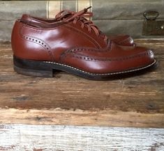 "Vintage boys Star Value Jr brown lace oxfords. Excellent condition with barely a sign of wear. Original box included, but it does show a lot fo wear. These date to circa 1940s. The insole is 8-1/8\" long and according to size charts, converts to a youth size 2, approximately in the 7 to 8 year range. Measurements: bottom of sole 9-1/4\" long 3-1/2\" across ball of foot insole 8-1/8\" long" Vintage Lace-up Oxfords, Vintage Oxfords With Rubber Sole, Vintage Wingtip Oxford Shoes, Vintage Lace-up Oxfords For Derby, Retro Style Lace-up Oxfords For Formal Occasions, Vintage Lace-up Oxfords With Rubber Sole, Vintage Lace-up Oxfords For Formal Wear, Vintage Lace-up Oxfords For Formal Occasions, Vintage Cap Toe Oxfords For Work