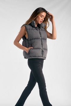 Embrace comfort and style with the Jemma Distressed Puffer Vest. Crafted from distressed denim, this zip-up puffer vest boasts a jumbo collar for a standout look. The pockets add a touch of functionality, making it a stylish choice for both layering and making a statement on its own. Stay warm while staying on-trend with the Jemma Puffer Vest, a versatile addition to your wardrobe. Puffer Vest, Denim Wash, Distressed Denim, Zip Up, Stay Warm, Layering, Puffer, Zip Ups, Wardrobe