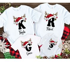 Personalized matching Christmas Family Shirts - Perfect for holiday pictures or even pj tops for Christmas Night.   This listing is for the tshirts only Available in Newborn - Toddler - Kids - Adult  Your Tshirts comes customized with the first letter of each family members name and their name written accross bottom of shirt These shirts are not vinyl, they are direct to garmet printing which prints directly into the fabric FREE SHIPPING any order over $35.00 automatically  Any questions, please White Family Matching Christmas T-shirt, Family Matching White Tops For Christmas, Family Matching White Christmas Tops, Holiday Custom Print Crew Neck Tops, White Pre-shrunk Christmas Tops, Holiday Custom Print Short Sleeve Tops, Holiday Tops With Custom Print And Short Sleeves, Christmas Crew Neck Top With Custom Print, Custom Print Christmas T-shirt