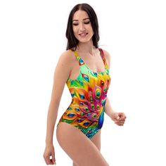 🦚This Women's One-Piece Swimsuit/Bathing Suit for all figures will bring out your best features. Enjoy the smooth fabric and the Unique Colorful Peacock Jeweled Design, and show it off by the beach or pool! * 82% Polyester, 18% Spandex * Fabric weight: 6.78 oz/yd² (230 g/m weight may vary by 5% * Chlorine-resistant fabric * Cheeky fit with a scoop neckline and a low scoop back * Zig-zag stitching * Double-layer front  * Four-way stretch material stretches and recovers on the cross and lengthwise grains Refer to Sizing Chart above in Photo Section Our Other One-Piece Swimsuits: https://www.etsy.com/shop/zazzfashion/?etsrc=sdt&section_id=45551037 Fitted Multicolor One-piece For Sunbathing, Multicolor One-piece Swimwear For Pool, Multicolor Sleeveless Tankini For Summer, Multicolor Sleeveless Summer Tankini, Multicolor Sleeveless Swimwear For Beach Party, Multicolor Sleeveless Tankini For Beach Season, Bohemian Multicolor Swimwear, Bohemian Multicolor Sleeveless Swimwear, Multicolor One-piece Tankini For Summer