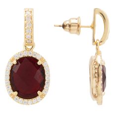 These exquisitely regal oval gemstone drop earrings are pure elegance in design. Make this super sparkly drop earring your everyday wardrobe staple. The multifaceted oval gemstone with illustrious cz detailing, which highlights the beauty of the central stone, reflects the light which dazzles from day to night. These earrings make an impact but are comfortable to wear.With associations with the heart, blood, inner fire, and life force, garnets have long been considered symbols of love. Garnet sy Gemstone Drop Earrings, Drop Earrings Gold, Stylish Earrings, Pure Elegance, Signature Jewelry, Circle Studs, Stylish Earring, Garnet Stone, Drop Earring