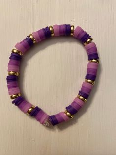 This fun bracelet will show your sassy style. If you like purple this bracelet is for you. Trendy Purple Friendship Bracelets As Gift, Trendy Purple Jewelry With Spacer Beads, Purple Friendship Bracelets With Colorful Beads, Trendy Crystal Bracelet With Colorful Beads, Adjustable Purple Bangle Bracelets, Purple Bracelet Jewelry For The Beach, Purple Bracelet Jewelry For Beach, Trendy Purple Beaded Bracelets For Party, Adjustable Lavender Beaded Bracelets, Trendy Style