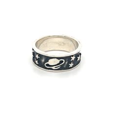 Delve into the unknown with this far-out Outer Space ring! An intergalactic treat for the curious who look to the heavens with an explorer's spirit! This unique band brings the far reaches of our galaxy down to earth with a striking space motif, contrasted by dark black antiquing. Built to survive all of your adventures, with its solid mold, this ring invites you to take a piece of our spectacular night sky everywhere the expansive universe carries you. Materials: .925 Sterling Silver Space Ring, Space Rings, Our Galaxy, Space Jewelry, Into The Unknown, Unique Bands, The Heavens, Down To Earth, The Unknown