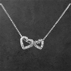 Open Double Hearts Cubics  * Set with Cubic Zirconia  Total length - 16inches ball chain. you may choose any length up to 20". (NO EXTRA COST) Please leave a note at checkout to specify an alternative length   All items come wrapped individually in a ribboned gift box. Thank you for looking. Mother's Day Party Sterling Silver Necklace, Open Heart Necklace For Valentine's Day Party, Valentine's Day Open Heart Necklace For Party, Silver Heart Cut Necklace For Party, Sterling Silver Heart Pendant Necklace For Parties, Sterling Silver Necklace With Heart Charm For Party, Sterling Silver Double Heart Jewelry For Party, Sterling Silver Heart Charm Necklace For Party, Valentine's Day Silver Charm Necklace With Delicate Chain