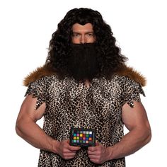 a man with long hair and a beard wearing a costume