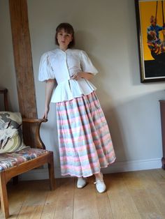 "A stunning vintage Bellville Sassoon silk skirt, from the 1980s. Made in England The outer fabric is a pure silk, stiff and shiny with a beautiful pastel stripe pattern. The skirt is also lined with stiff synthetic fabric, and has a tulle ruffled hem for more volume. Full design with great movement and a very satisfying rustling sound. In very good vintage condition. The raw silk has a naturally rough texture, but the imperfections are just part of its charm! Marked as a size 14, but comes up s Vintage Silk Long Skirt, Vintage Gathered Skirt For Daywear, Vintage Tiered Skirt For Daywear, Vintage Summer Skirt For Daywear, Vintage Gathered Maxi Skirt For Spring, Vintage Voluminous Skirt For Summer, Vintage Tiered Gathered Skirt, Vintage Full Maxi Skirt With Gathered Details, Vintage Tiered Maxi Skirt For Spring