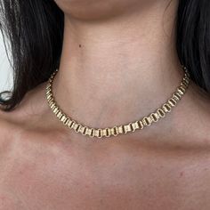 Expertly crafted with a 14k Gold-Filled chain, the Monet Necklace makes a bold statement. This chunky statement piece is made with a textured link design, ensuring durability & long-lasting shine. Elevate any outfit with the stunning, versatile Monet Necklace. Product Details: 16" 14k Gold-Filled Monet Chain Water-Wearable Made in Scottsdale, AZ Click Here to Buy an Extender Formal Metal Chain Necklace With Rectangular Links, Chic Jewelry With Solid Chain Link Construction, Timeless Jewelry With Chunky Chain Link, Metal Necklaces With Chunky Chain And Rectangular Links, Timeless Chunky Chain Link Jewelry, Timeless Gold Chain Necklace, Chunky Chain Oval Link Necklaces, Chunky Chain Oval Link Necklace, Formal Gold Plated Chunky Chain Necklace