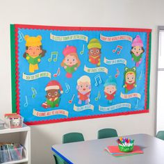 a classroom wall decorated with children's christmas decorations