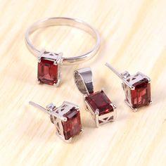 "This Jewellery features a beautiful Garnet gemstone set in a customized sterling Silver A lovely Jewellery to your jewelry collection ! Item Description ! => Gemstone Type - Garnet => Gemstone Size - 5x7mm => Gemstone Cut - Faceted Square => Metal Type (Main Photo) - 925 Sterling Silver =>Gemstone Quality: AAA+ ? Shipping information : ? Tracking number ? ? Expedited / Express shipping - check our \"shipping upgrades\" when you checkout Feedback: \"We are always happy to get your Fine Jewelry Sets In White Gold For Gifts, Fine Jewelry Sets In White Gold As Gift, Silver Sterling Silver Jewelry Sets For Anniversary, Classic Sterling Silver Jewelry Sets For Gift, Fine Jewelry Sterling Silver Jewelry Sets, Sterling Silver Pendant Jewelry Set For Formal Occasions, Sterling Silver Fine Jewelry Sets, Fine Jewelry In Sterling Silver With Polished Finish, Sterling Silver Fine Jewelry With Polished Finish